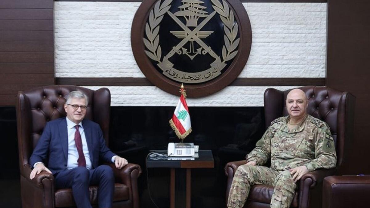 Jean-Pierre Lacroix sits with a peacekeeping representative.