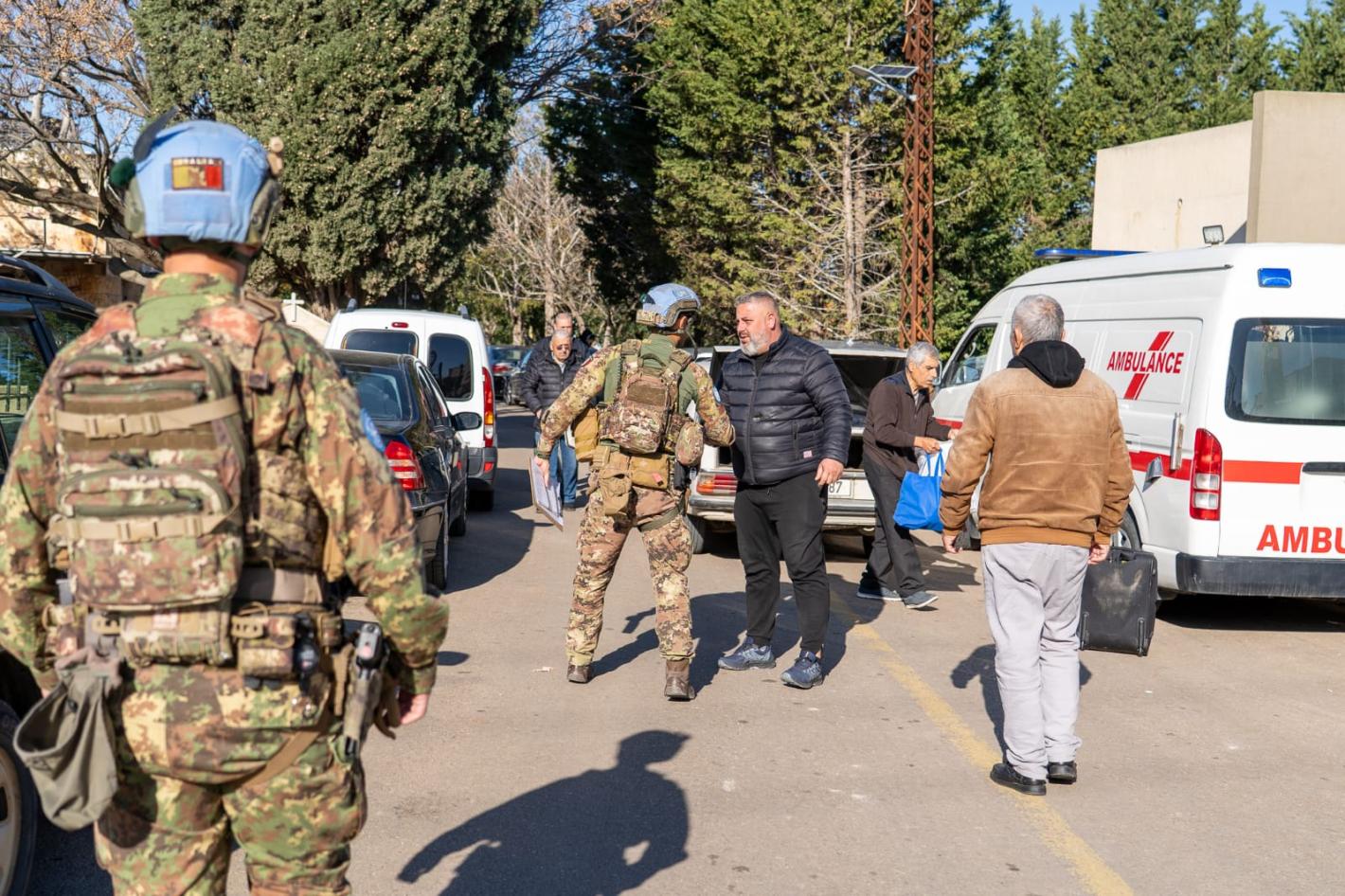 UNIFIL peacekeepers meet civilians waiting to be evacuated